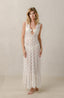 White lace coverup for women with ruffle bottom.