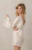 White floral lace swim cover for women.