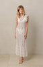 Lace beach coverup with ruffle details.