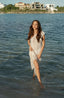 One shoulder beach cover-up with lace fabric.