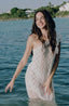 Floral lace fabric beach coverups with white fabric.
