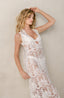 White cover-ups for the beach with lace fabric.