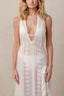 V-neck swim coverup with lace fabric details and leg slit.