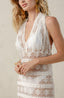 White swimsuit coverup with lace and ruffle details and beautiful fabric.